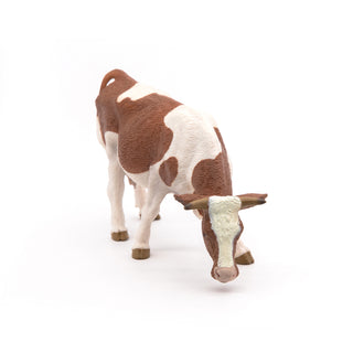 GRAZING SIMMENTAL COW
