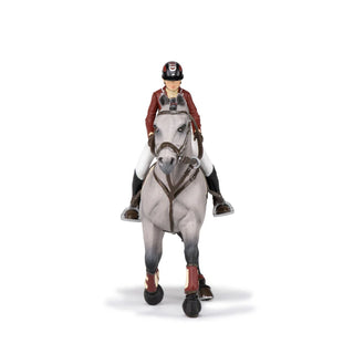 COMPETITION HORSE WITH RIDING GIRL